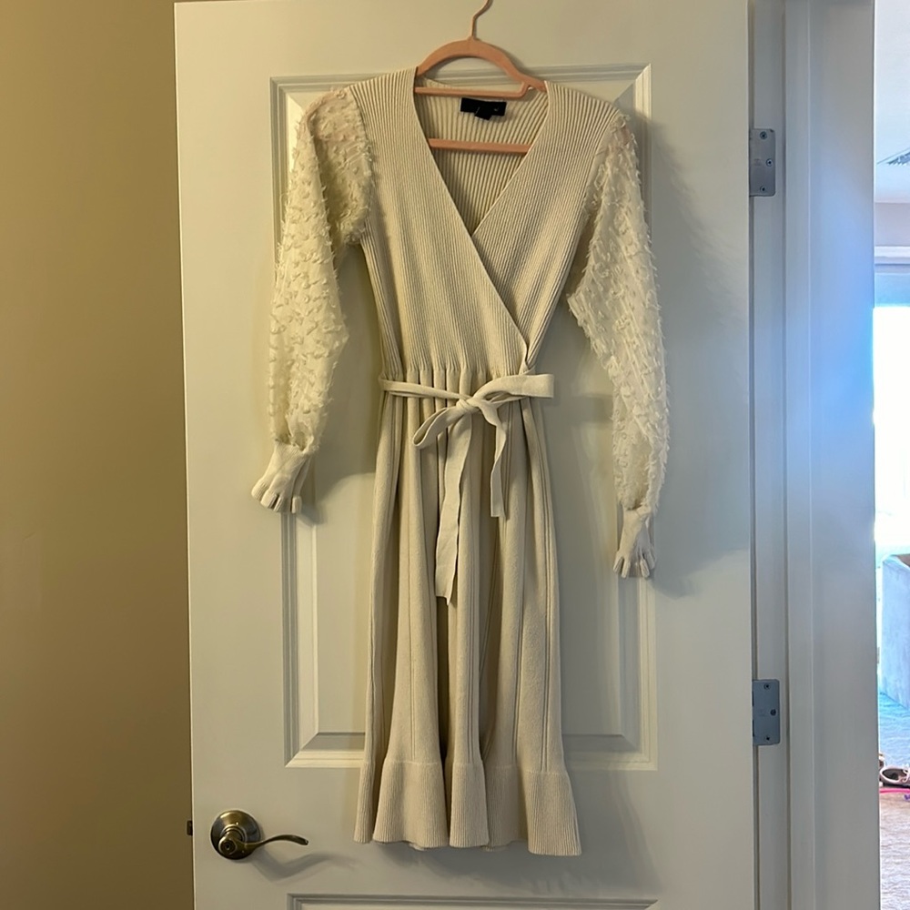 Boutique, sweater dress, with detailed sleeves.